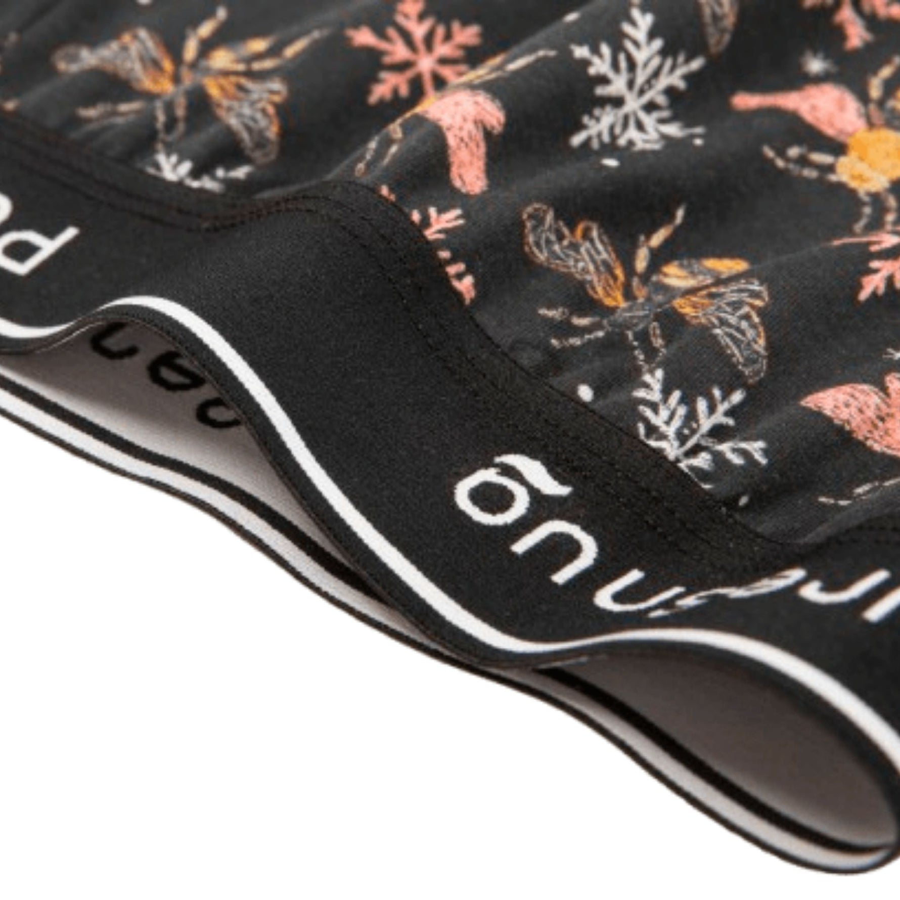 PureSnug Bees Knees lounge short with bees and snowflakes pattern and brand logo on a white background