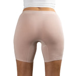 Back view of PureSnug Blush Beige boxer shorts worn by a person on a white background