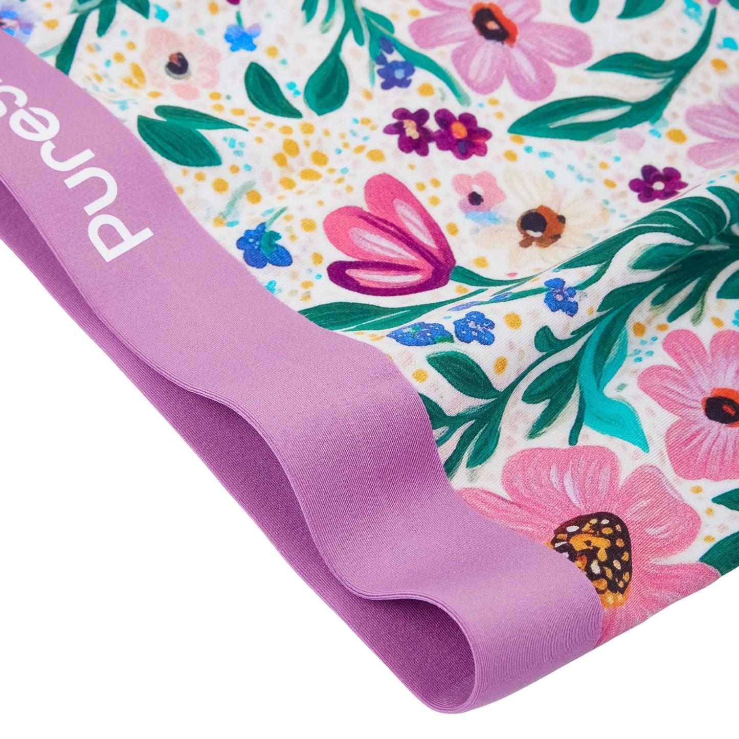 This PureSnug Boyleg in the Meadow Muse print combines soft modal fabric with a purple elastic waistband.
