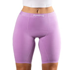 Orchid biker shorts with 'PureSnug' branding on a white background