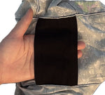 Hand holding a black organic cotton floating gusset of pure snug underwear